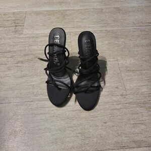 Deleventh’s Black Strap-Up Heels